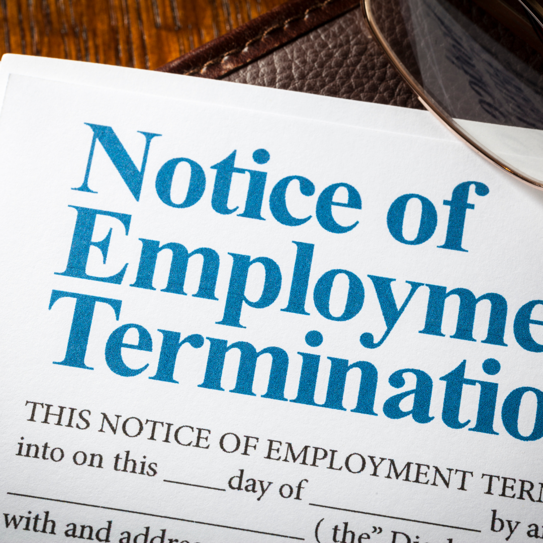 Close-up of a termination, symbolizing employee dismissal and formal notice in a professional setting.